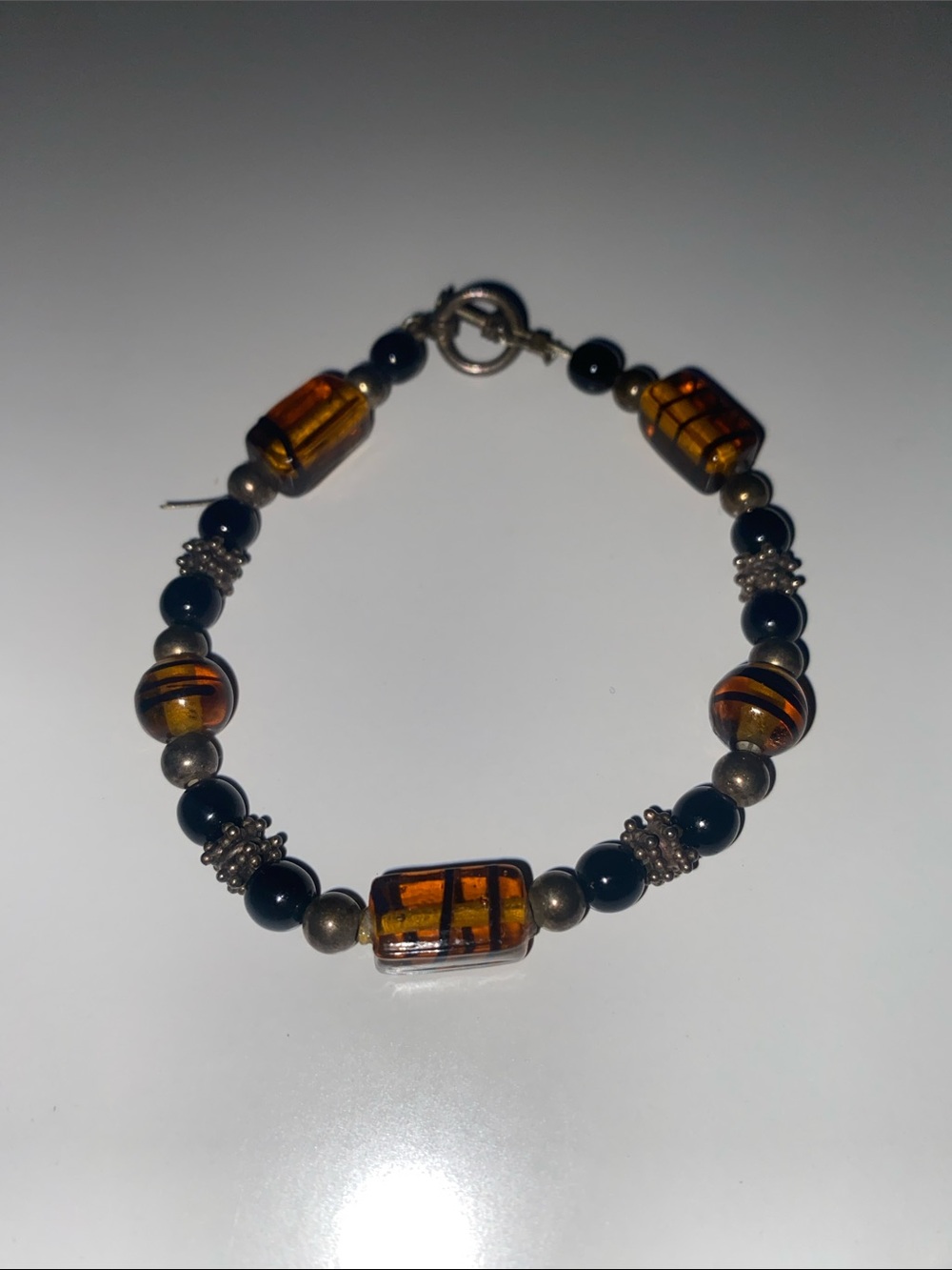 Handcrafted Amber Glass & Black Bead Bracelet